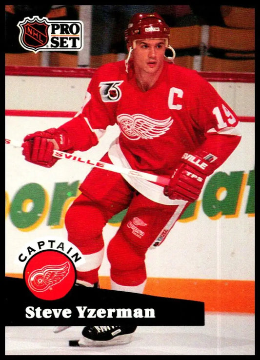 Hockey player in red Detroit Red Wings jersey with captain’s C, featuring Steve Yzerman Pro Set card