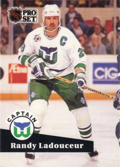 Hockey player in Hartford Whalers jersey with captain’s C, featured in Randy Ladouceur card