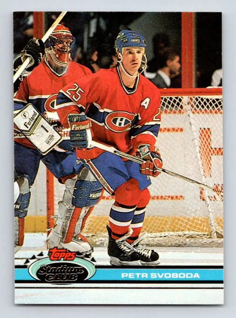 Hockey card of Petr Svoboda in red uniform for Montreal Canadiens gameplay action