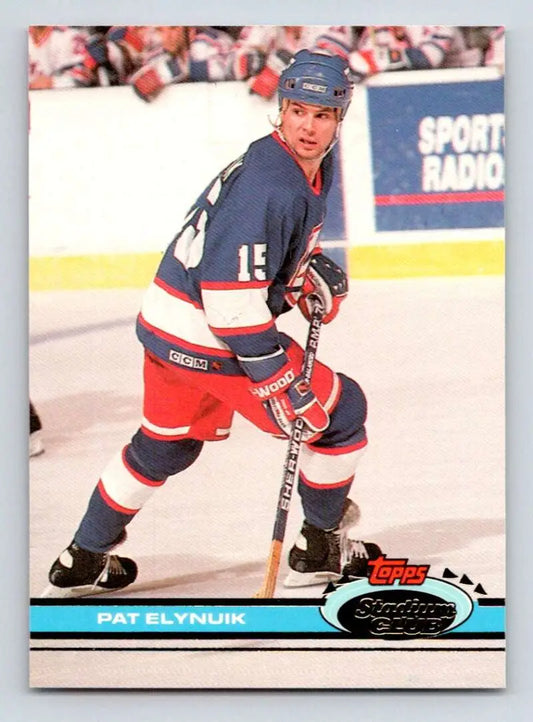 Hockey card of Pat Elynuik in Winnipeg Jets uniform, 1991-92 Topps Stadium Club #132