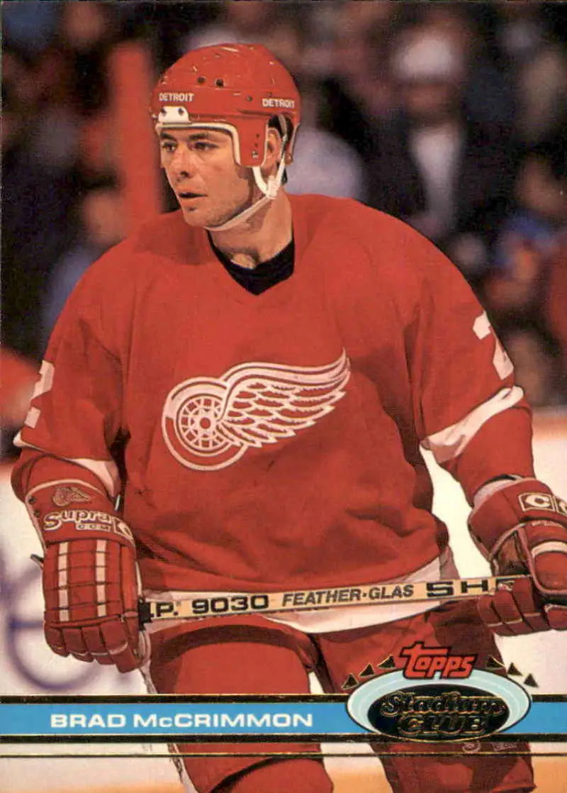 Detroit Red Wings player in classic red jersey featuring winged wheel logo