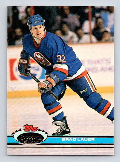 Hockey player in blue New York Islanders jersey #32 action, Topps Stadium Club card