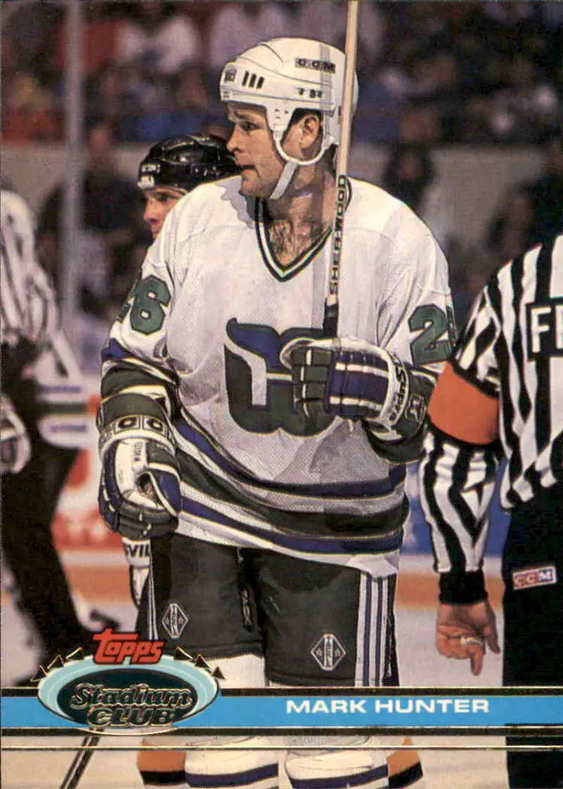Hockey player in white Hartford Whalers jersey with stick for Mark Hunter hockey card