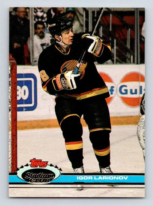 Vancouver Canucks Hockey Card of Igor Larionov in black and yellow uniform