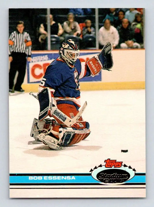 Hockey trading card of Bob Essensa making a save in Topps Stadium Club Winnipeg Jets uniform