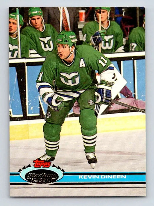 Hockey player in green Hartford Whalers jersey skating, Kevin Dineen Topps Stadium Club card