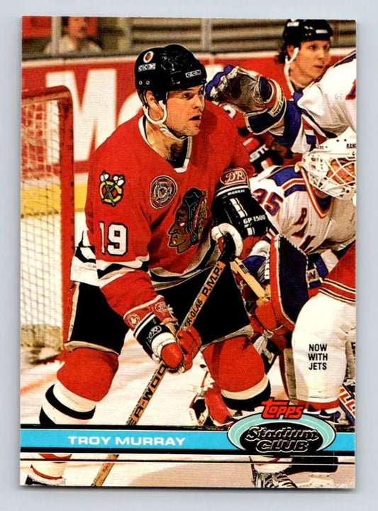 Hockey card of Troy Murray in red and black Chicago Blackhawks jersey number 19