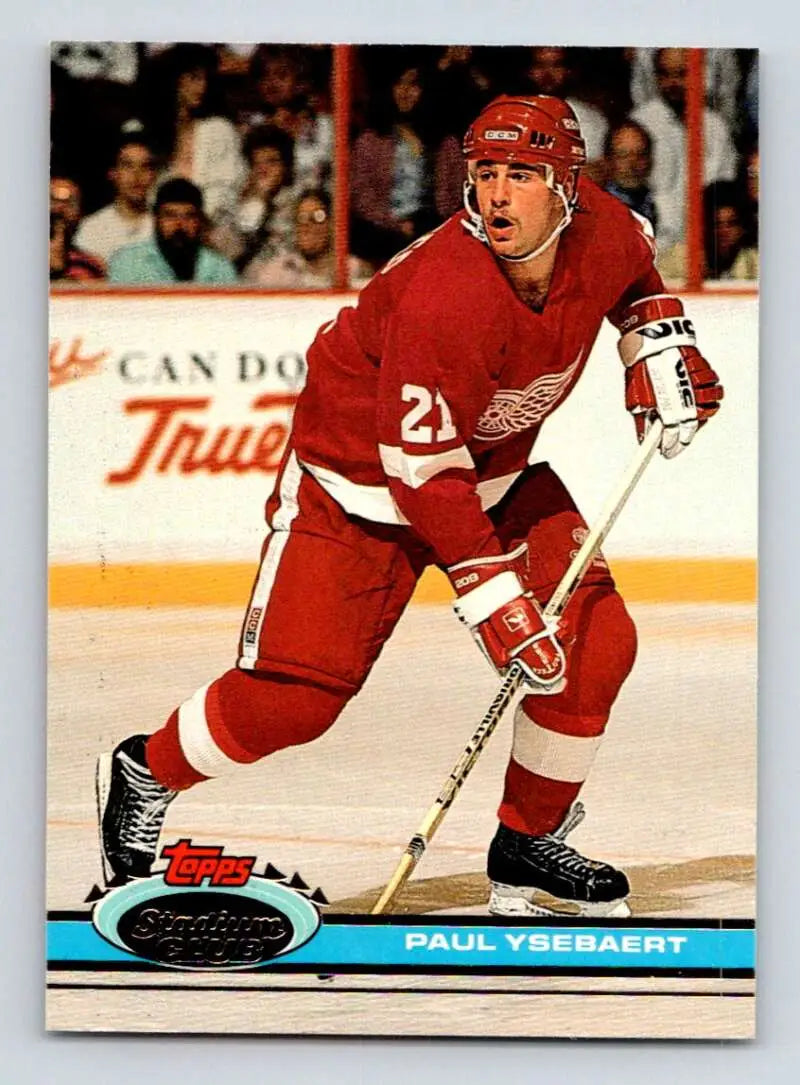 Detroit Red Wings player #21 Paul Ysebaert skating with stick in red uniform