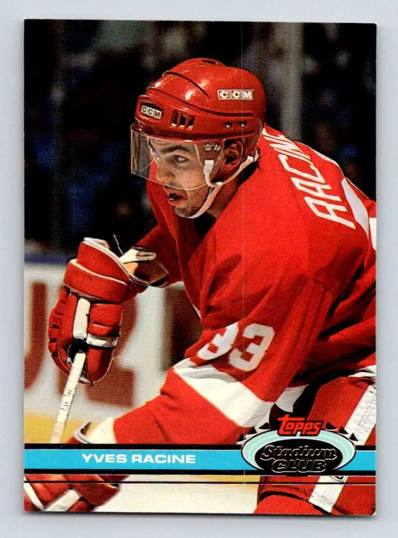 Hockey player in red Detroit Red Wings jersey number 99 from Yves Racine card