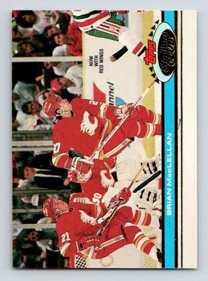 Hockey trading card featuring Detroit Red Wings players celebrating on ice