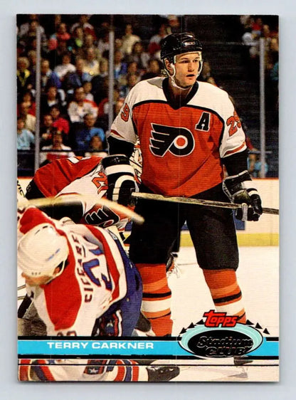 Hockey player in Philadelphia Flyers jersey on Terry Carkner hockey card