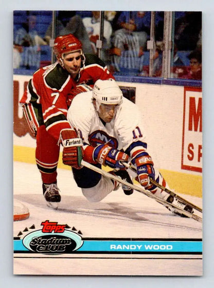 Hockey card featuring Randy Wood and York Islanders players battling for the puck