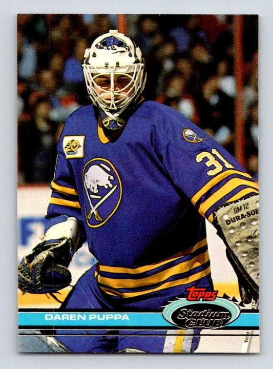 Daren Puppa in blue and yellow jersey 31 on a Buffalo Sabres Stadium Club card