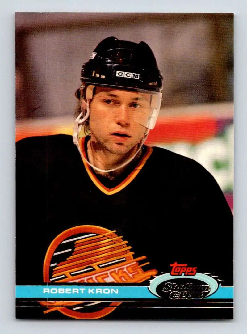 Hockey player in black Vancouver Canucks jersey from Topps Stadium Club Robert Kron card