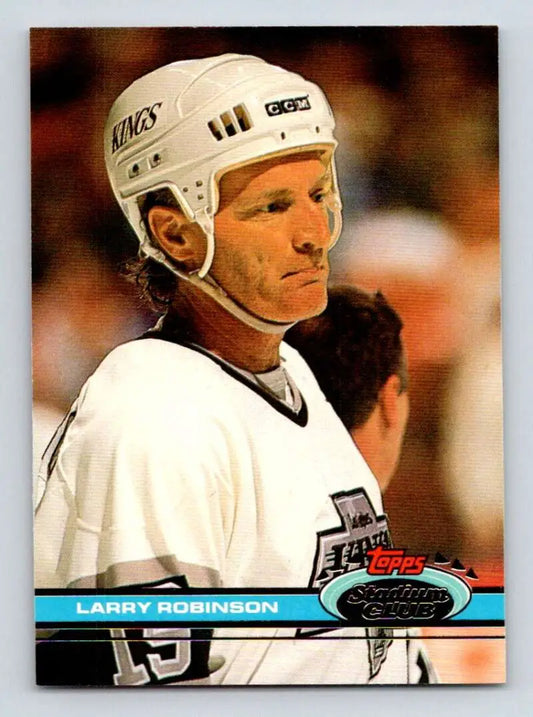 Hockey trading card of Larry Robinson in Los Angeles Kings white jersey and helmet