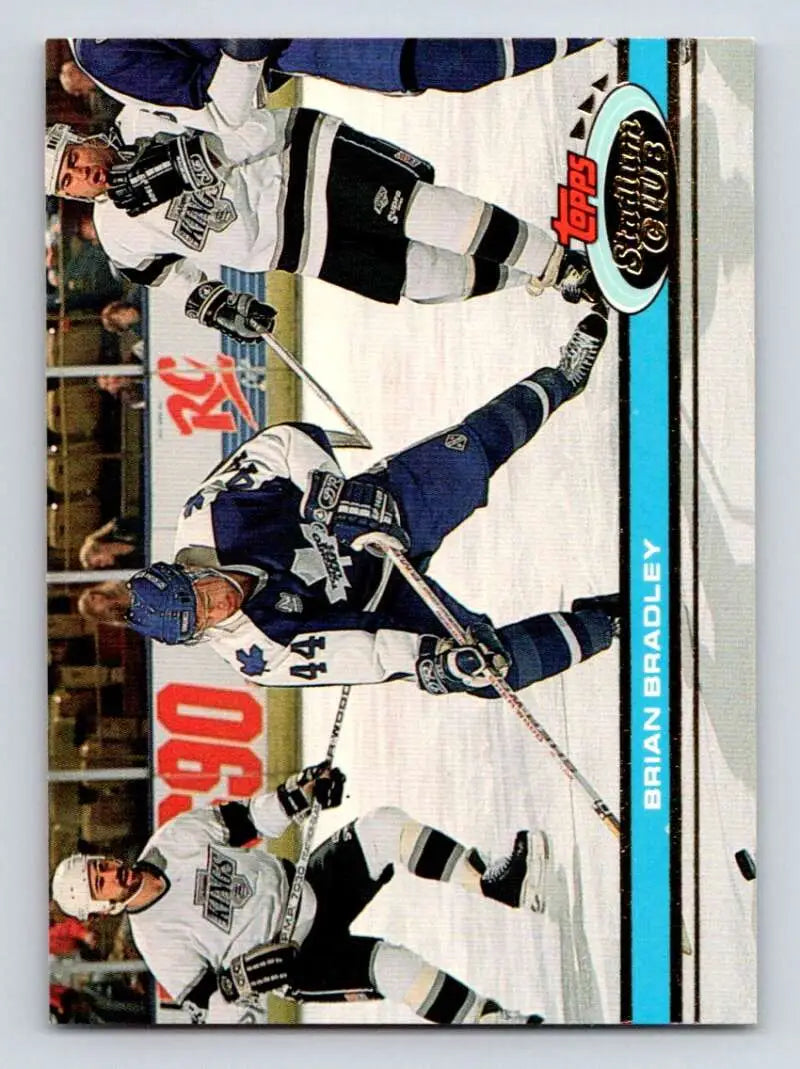 Hockey trading card featuring Los Angeles Kings and Tampa Bay Lightning players in action