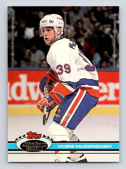 Hockey player in Montreal Canadiens uniform skating, Hubie McDonough New York Islanders Hockey Card