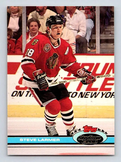 Steve Larmer in Chicago Blackhawks red jersey, featured in Topps Stadium Club card