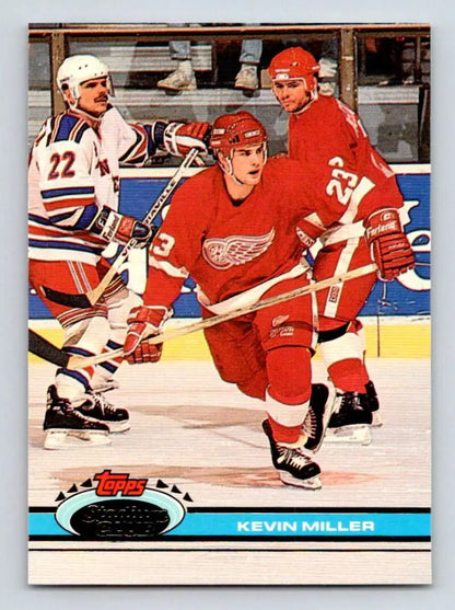 Hockey trading card of Kevin Miller in action for Detroit Red Wings vs New York Rangers