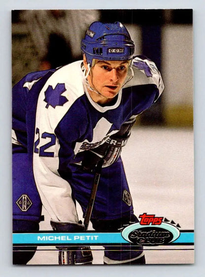 Hockey player in Toronto Maple Leafs jersey 42, featuring Michel Petit on card #311