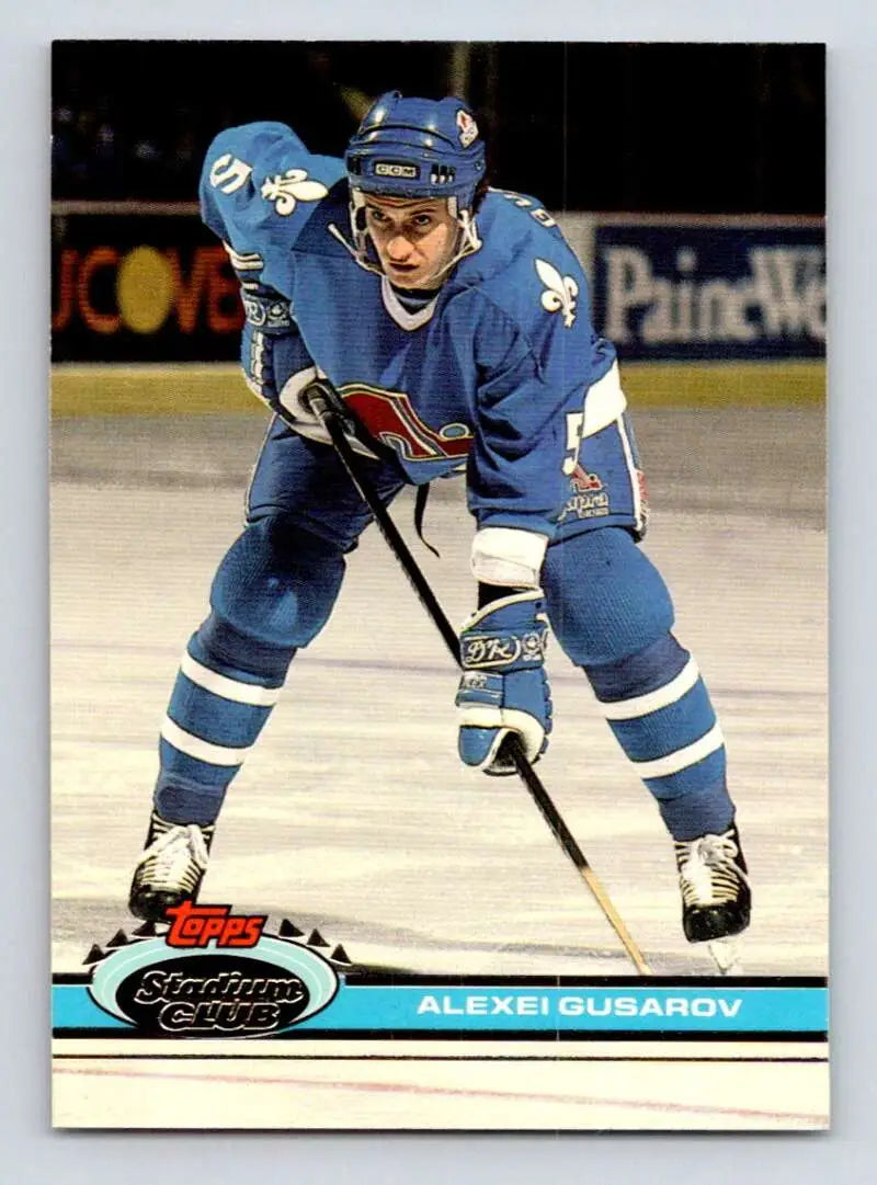 Quebec Nordiques player skating in blue uniform featured on Topps Stadium Club hockey card