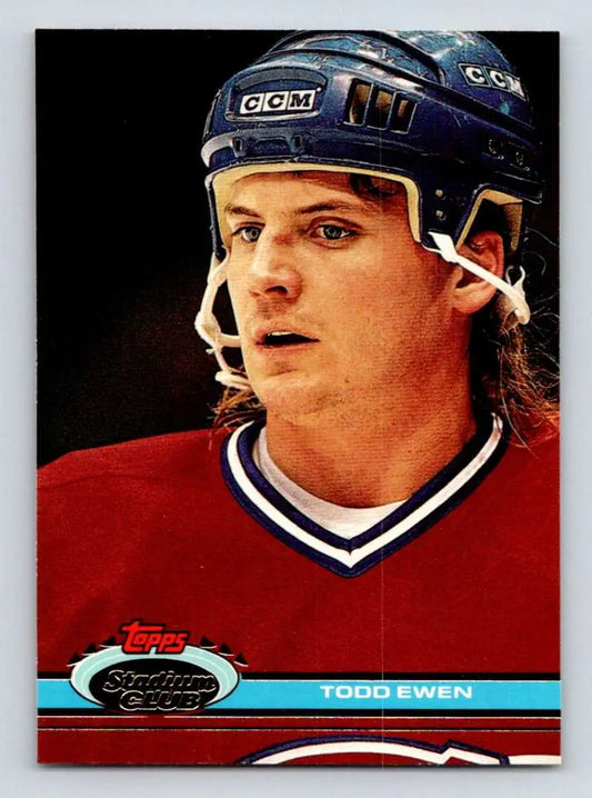 Hockey player in Montreal Canadiens jersey and CCM helmet on Todd Ewen hockey card