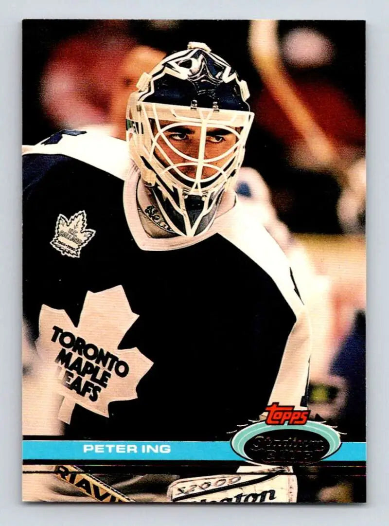 Toronto Maple Leafs goalie Peter Ing in black and white jersey with mask