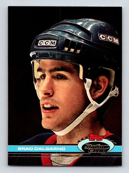 Hockey player in a CCM helmet wearing a dark uniform for Brad Dalgarno New York Islanders hockey card