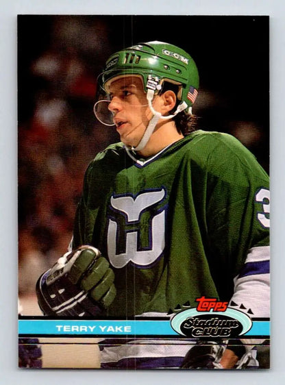 Hockey player in green Hartford Whalers jersey for Terry Yake Topps Stadium Club card