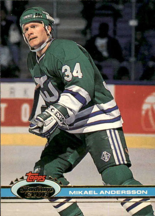Hockey player in green #34 Hartford Whalers jersey, action shot for Mikael Andersson card
