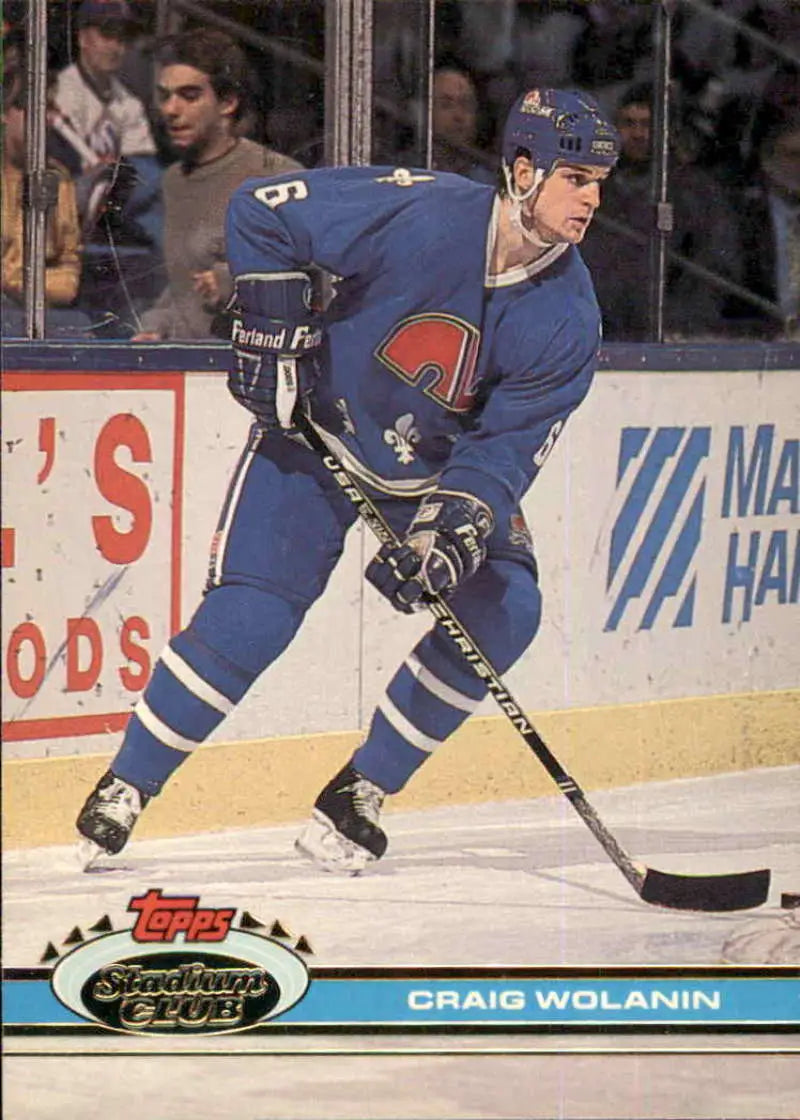 Quebec Nordiques player Craig Wolanin skating in a blue jersey on ice for Stadium Club card