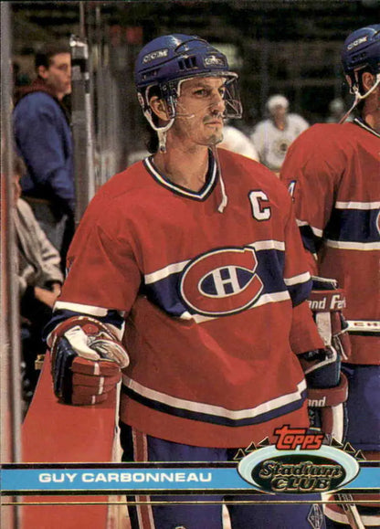 Montreal Canadiens hockey card featuring Guy Carbonneau in a red jersey and blue helmet