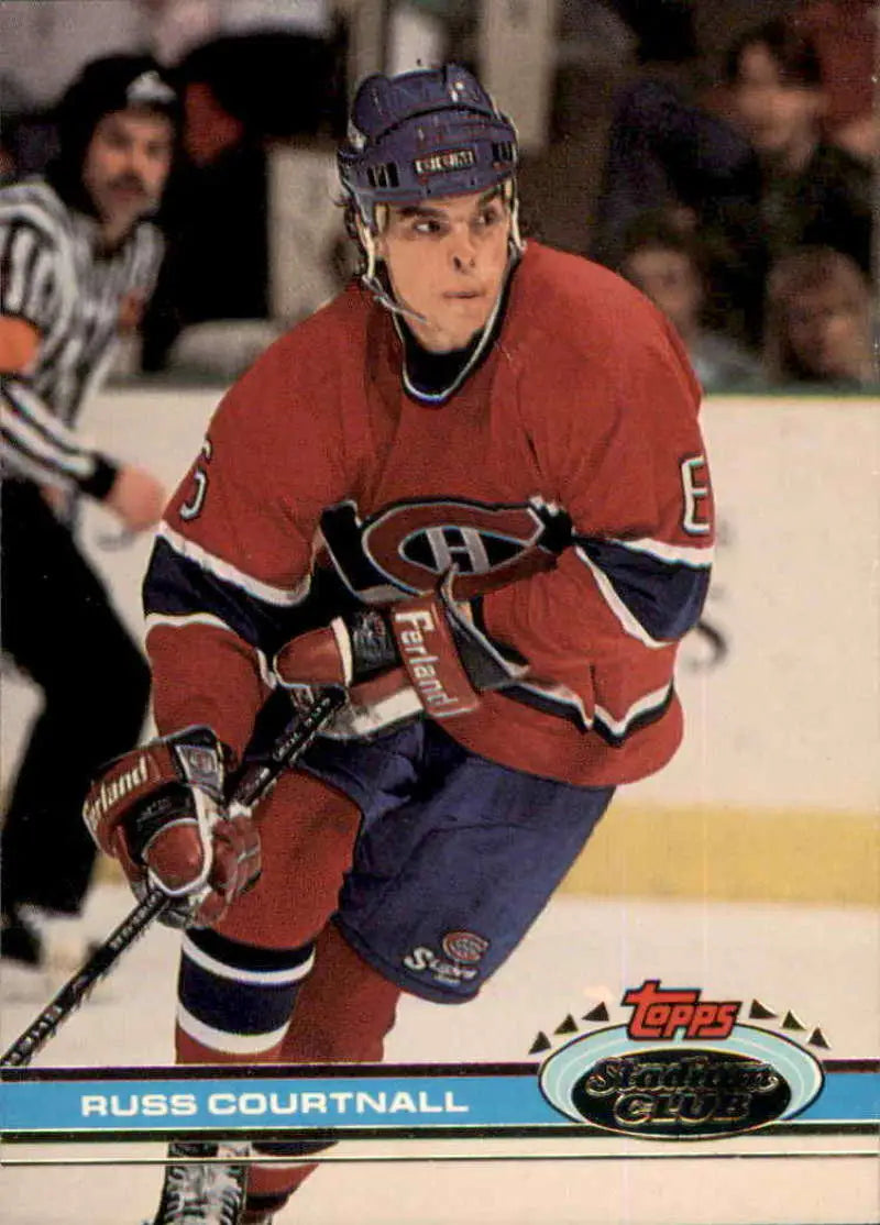 Hockey player in Montreal Canadiens jersey showcasing Russ Courtnall on ice action