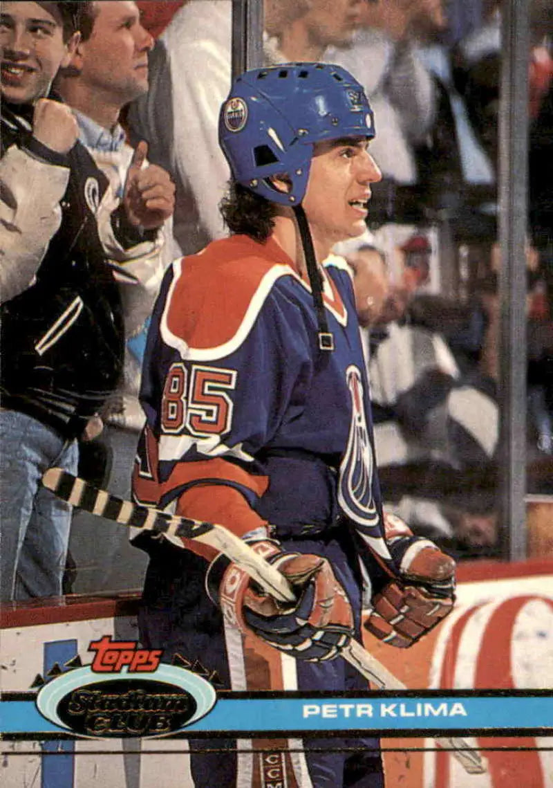 Hockey player in Edmonton Oilers jersey #85, showcasing 1991-92 Topps Stadium Club card
