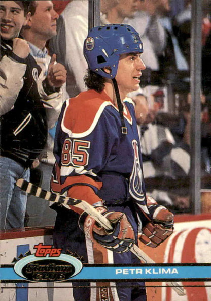 Hockey player in Edmonton Oilers jersey #85, showcasing 1991-92 Topps Stadium Club card