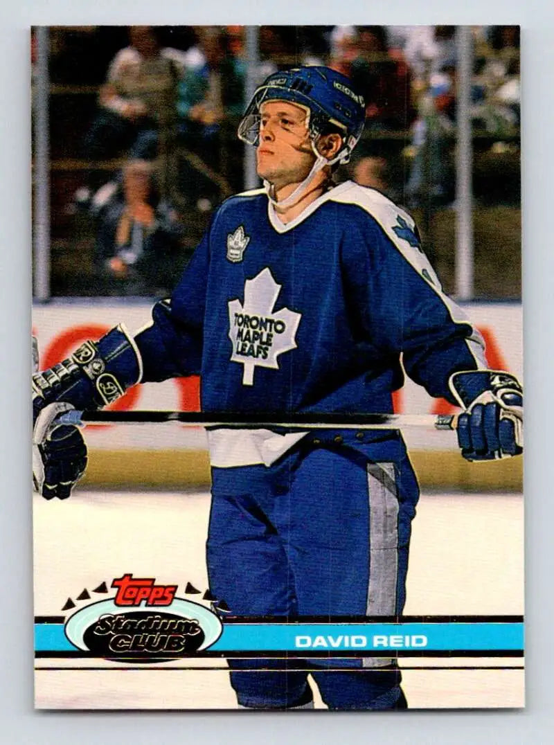 Hockey player in Toronto Maple Leafs jersey featured on David Reid hockey card
