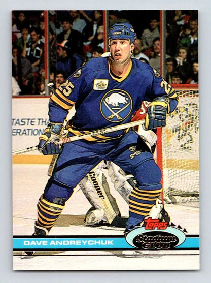 Hockey player in blue Buffalo Sabres jersey on Topps Stadium Club hockey card