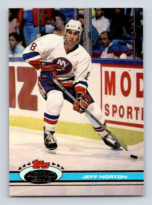 Hockey player in New York Islanders jersey controls puck for Jeff Norton hockey card