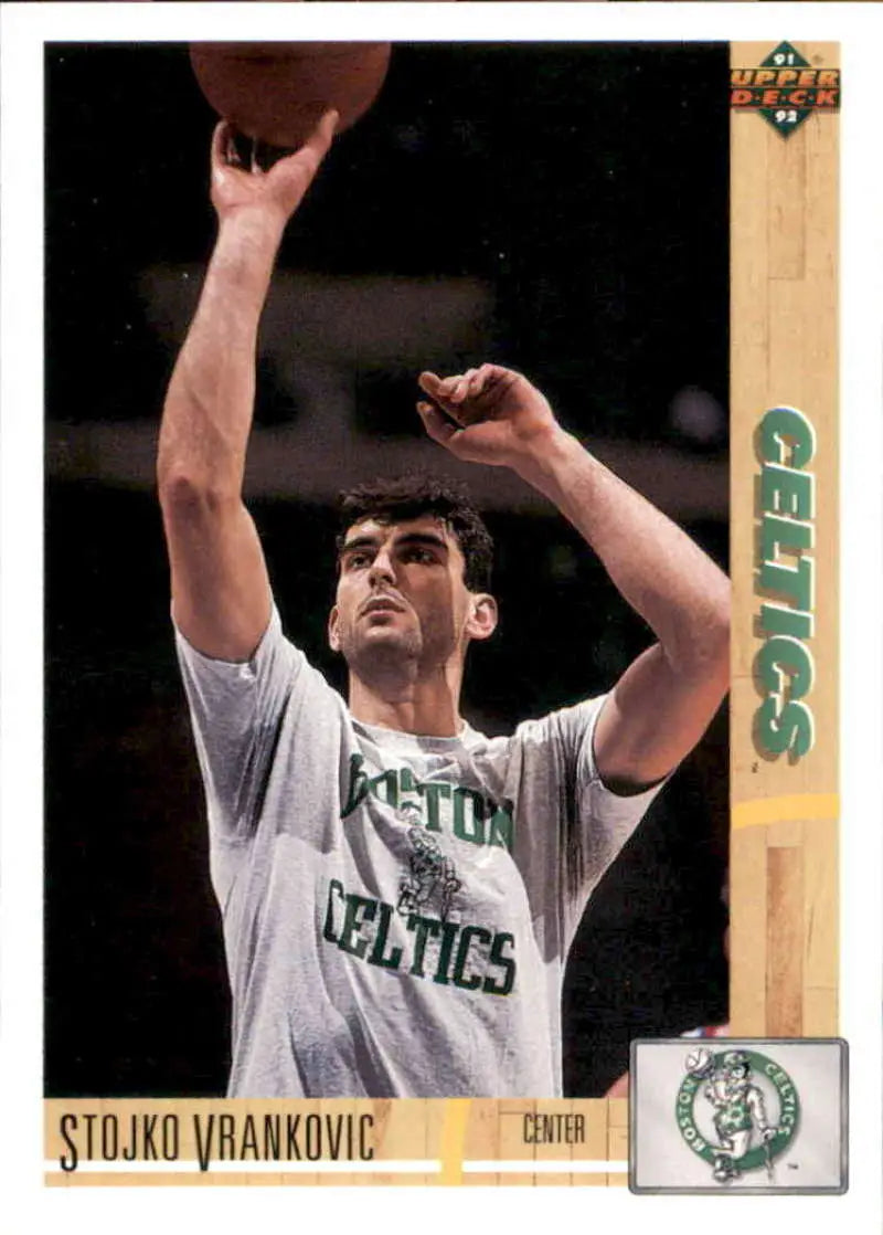 Basketball trading card of Stojko Vrankovic in Boston Celtics jersey shooting ball