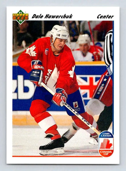 Hockey player in red Team Canada jersey showcasing Dale Hawerchuk Upper Deck card