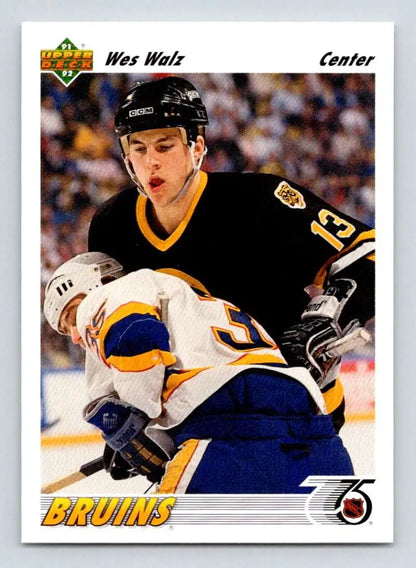Hockey card of Wes Walz showcasing Boston Bruins player colliding with Sabres player