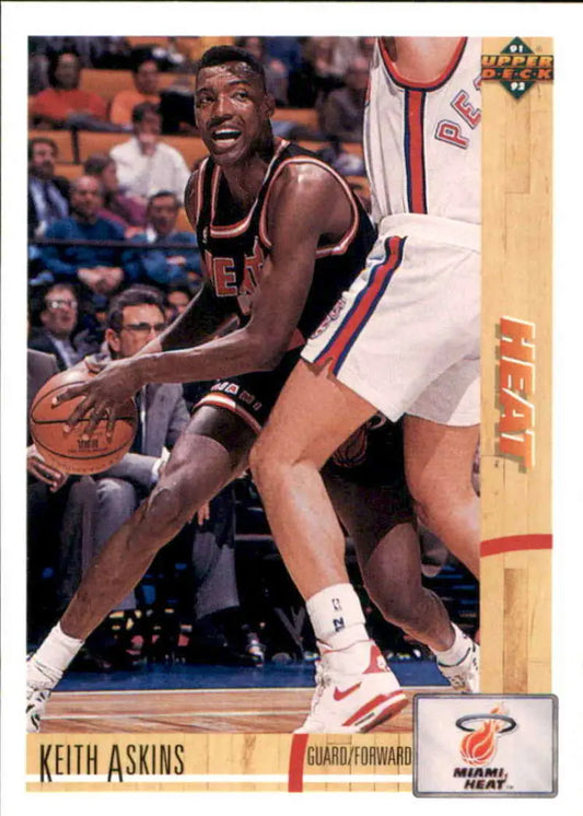 Basketball player in dark uniform with ball on 1991-92 Keith Askins Miami Heat card