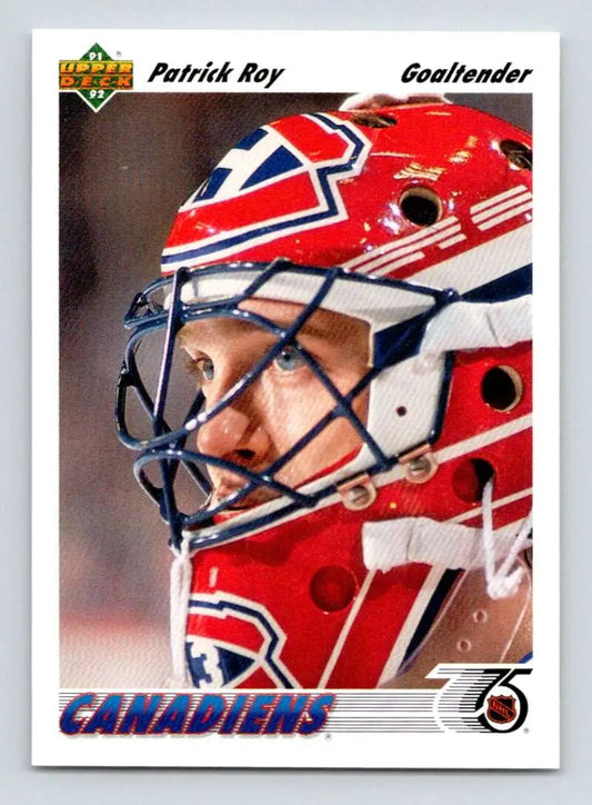 Red and white hockey goalie mask with blue design on 1991-92 Upper Deck Patrick Roy card