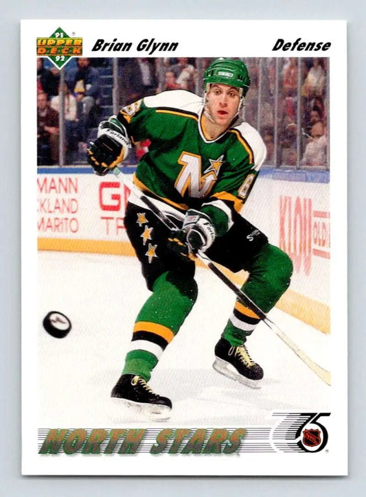 Brian Glynn skating in a green Minnesota North Stars jersey for Upper Deck hockey card