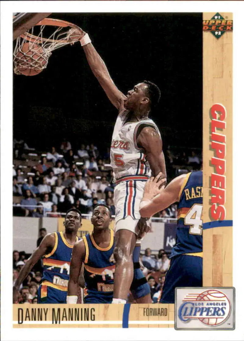 Danny Manning dunking in white Clippers uniform on 1991-92 Upper Deck basketball card