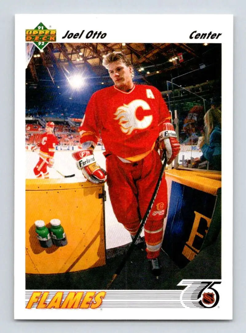 Hockey player in red Calgary Flames jersey with ’C’ on 1991-92 Joel Otto Hockey Card