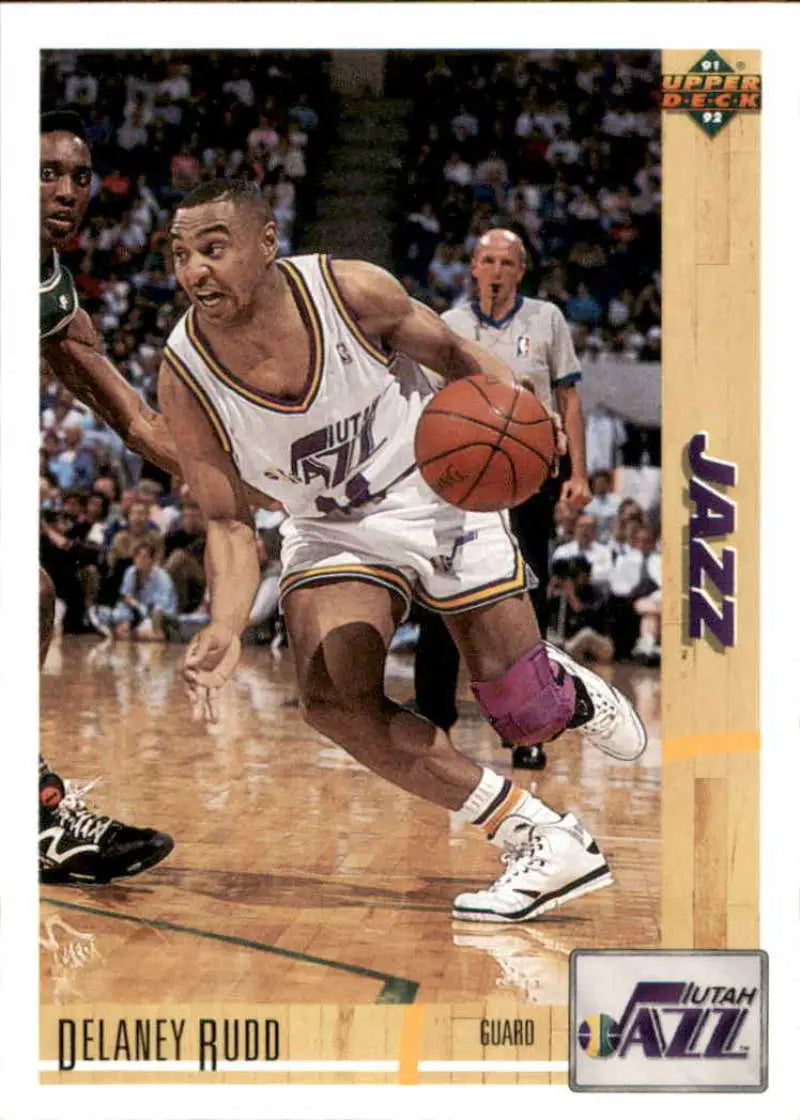 Delaney Rudd dribbling the ball in a Utah Jazz uniform from Upper Deck card