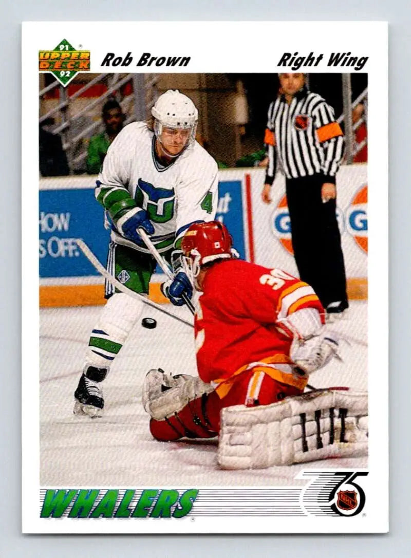 Hockey player in Whalers jersey faces goalie in red on 1991-92 Upper Deck Rob Brown card