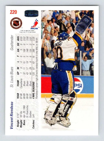 Vincent Riendeau celebrates on a 1991-92 Upper Deck Hockey Card in blue and yellow uniform