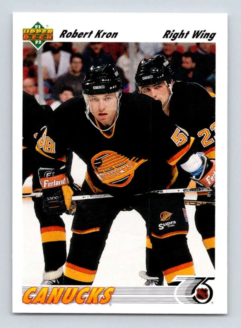 Robert Kron Vancouver Canucks hockey card in black jersey with orange trim Upper Deck